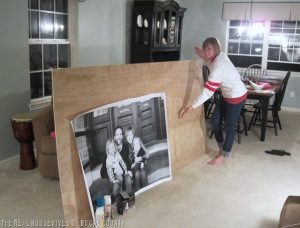 woman with giant Staples engineering print