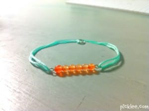 tangerine bead strand bracelet