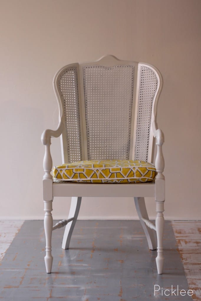 white cane arm chair