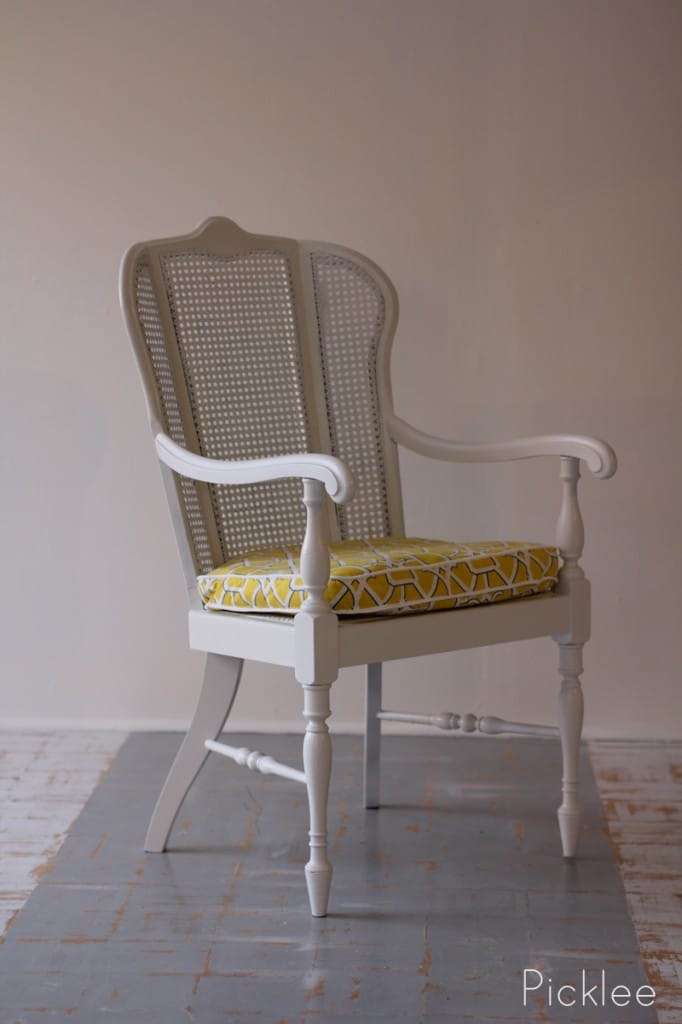 white cane arm chair yellow cushion2