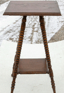 spool leg table antique