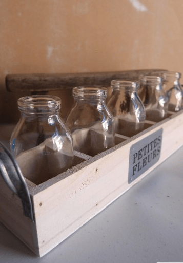milk bottles in wood crate